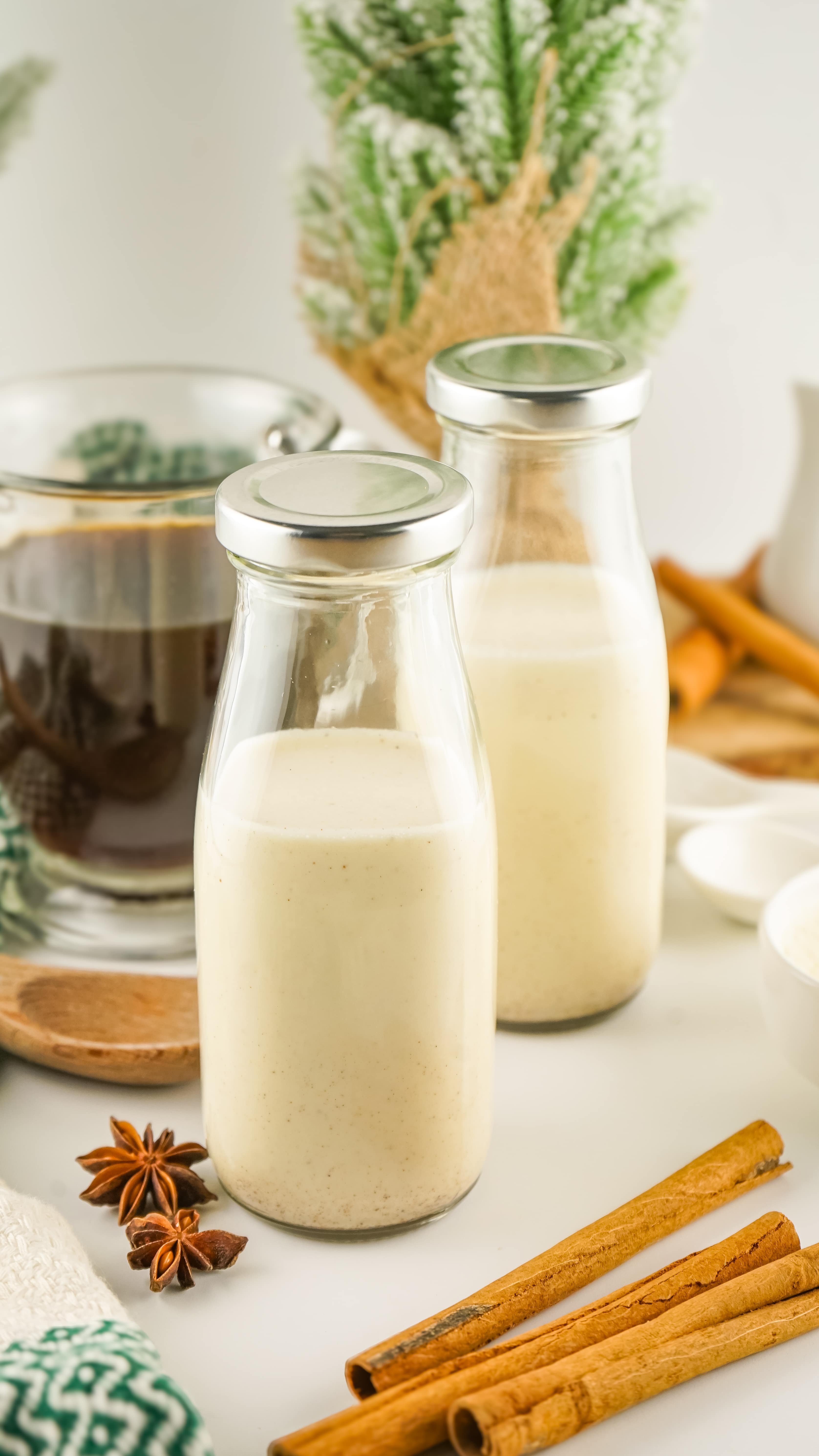 homemade eggnog coffee creamer in a small glass milk jar