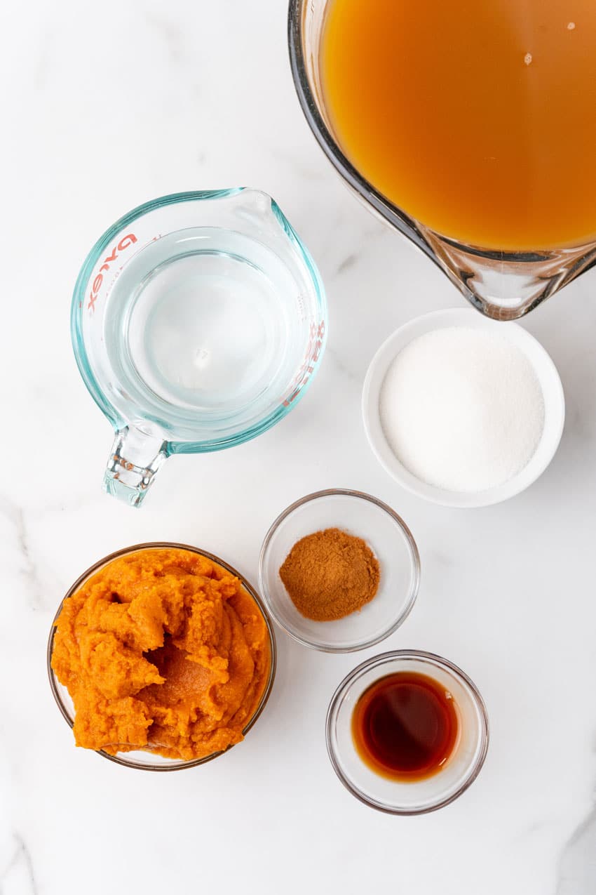 an overhead image showing the measured ingredients needed to make a batch of pumpkin juice from harry potter