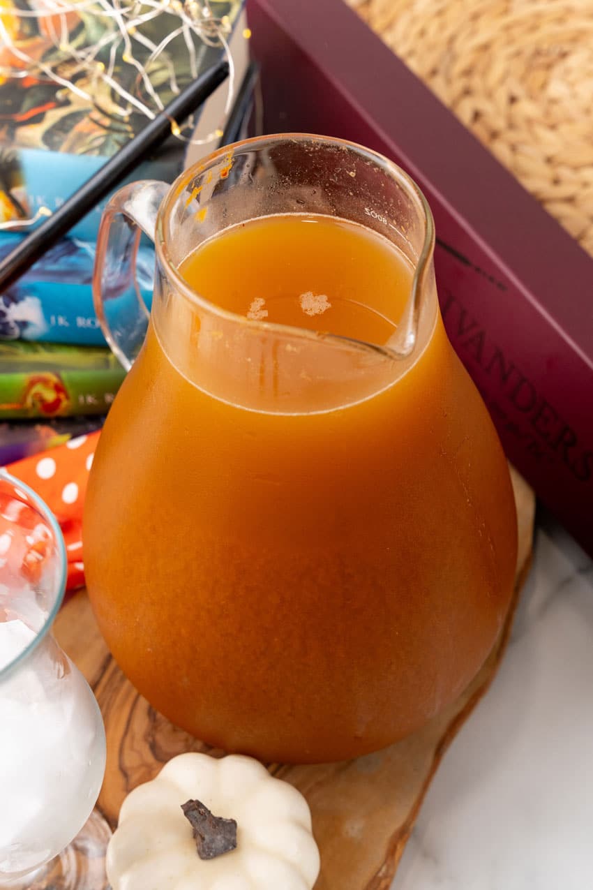 harry potter pumpkin juice recipe in a small glass pitcher