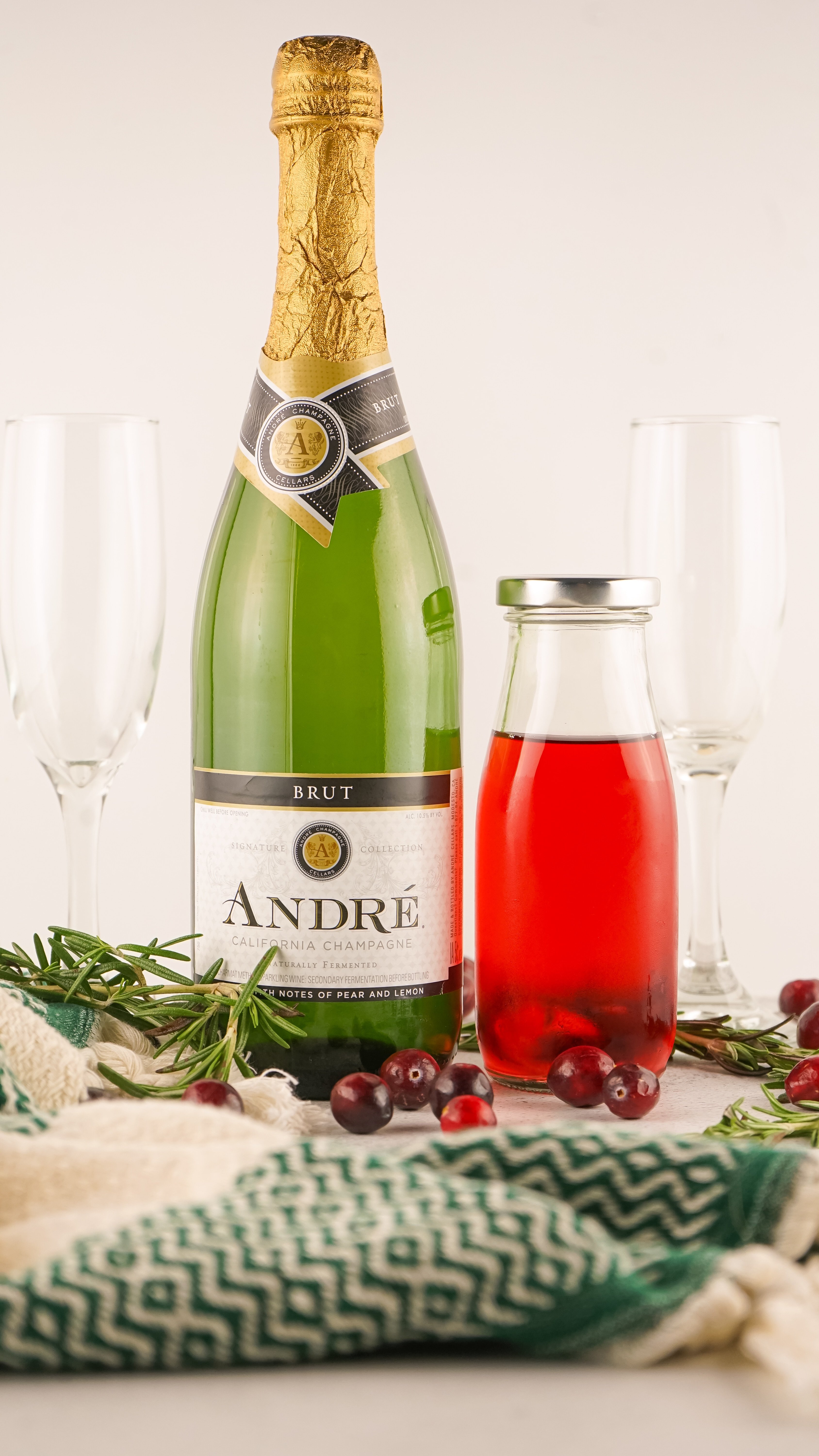 an image showing the measured ingredients needed to make cranberry mimosas