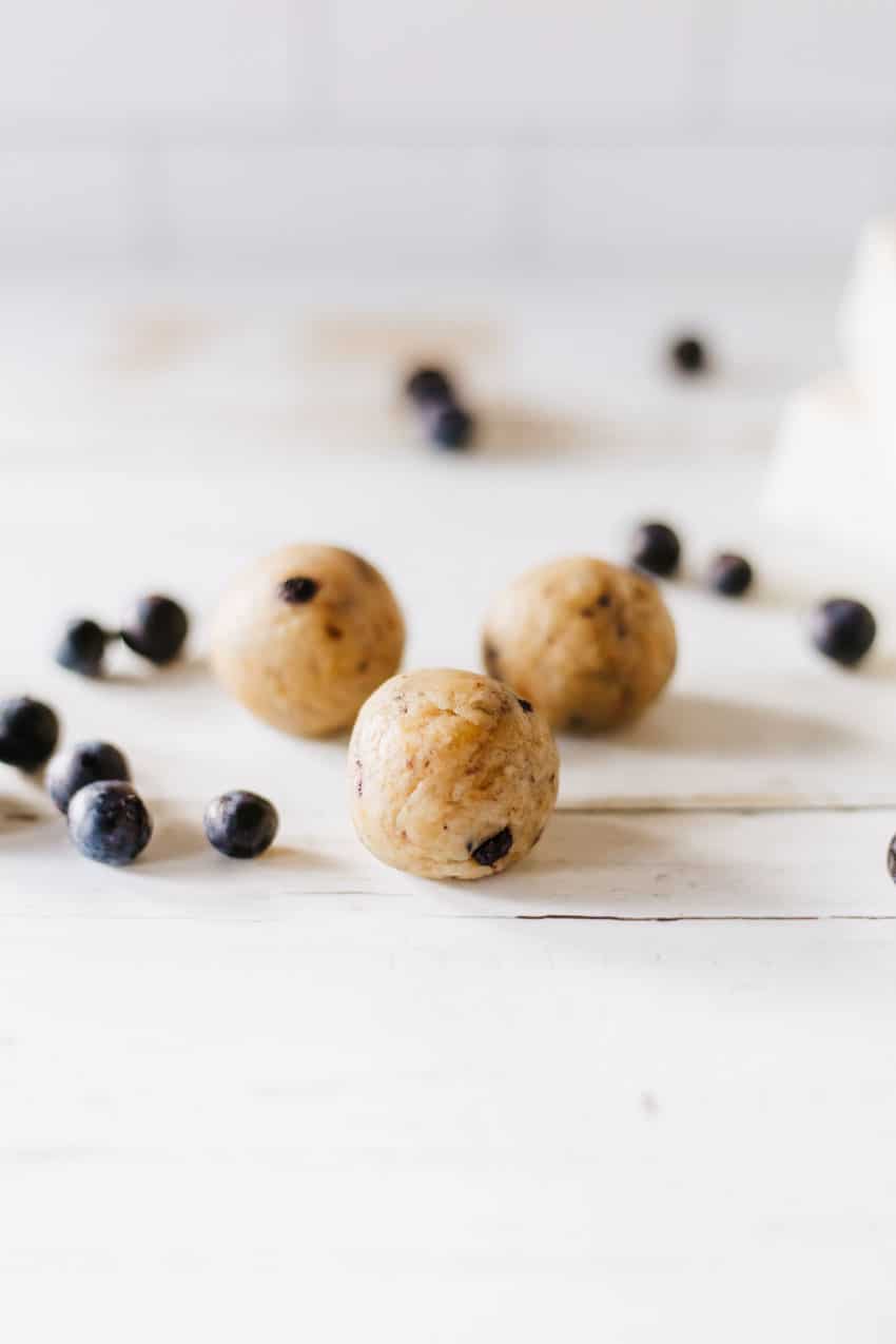 blueberry muffin balls on a wooden table