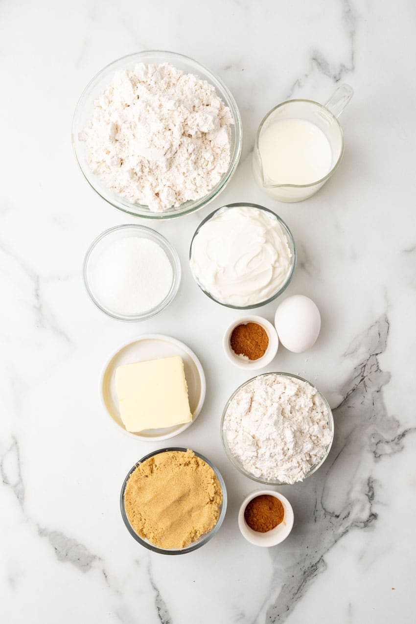 an overhead image showing the measured ingredients needed to make a homemade coffee cake with bisquick