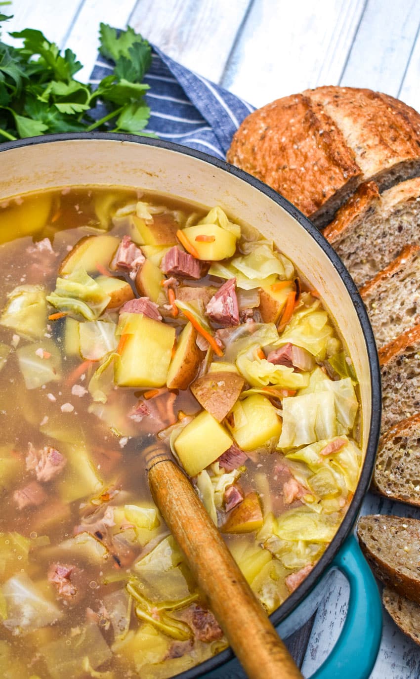 corned beef and cabbage soup in a large dutch oven