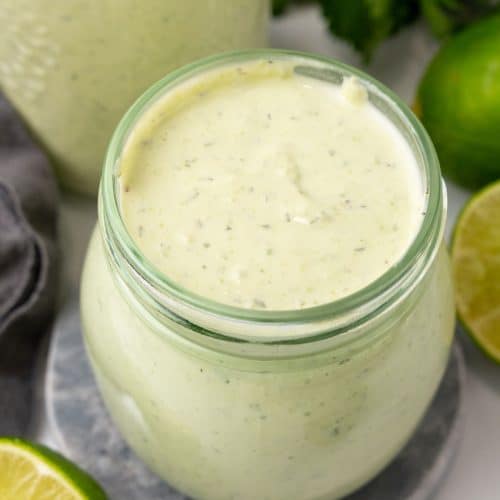 avocado lime dressing in small glass jars