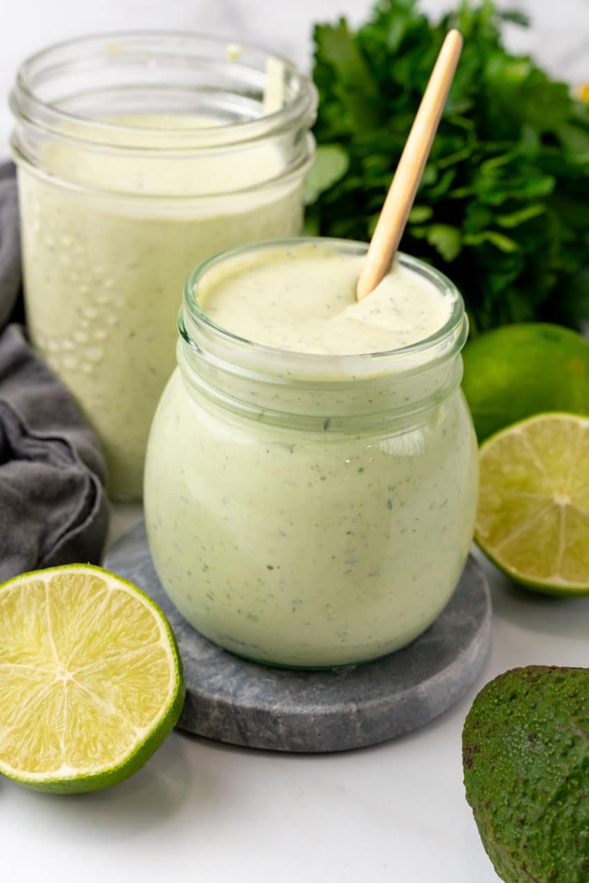 avocado lime dressing in small glass jars