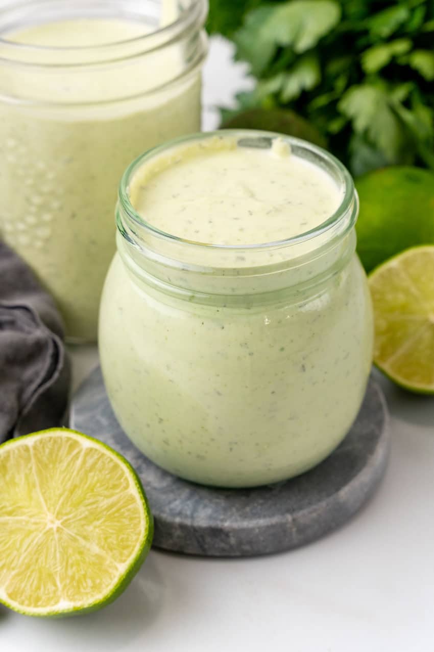 avocado lime dressing in small glass jars