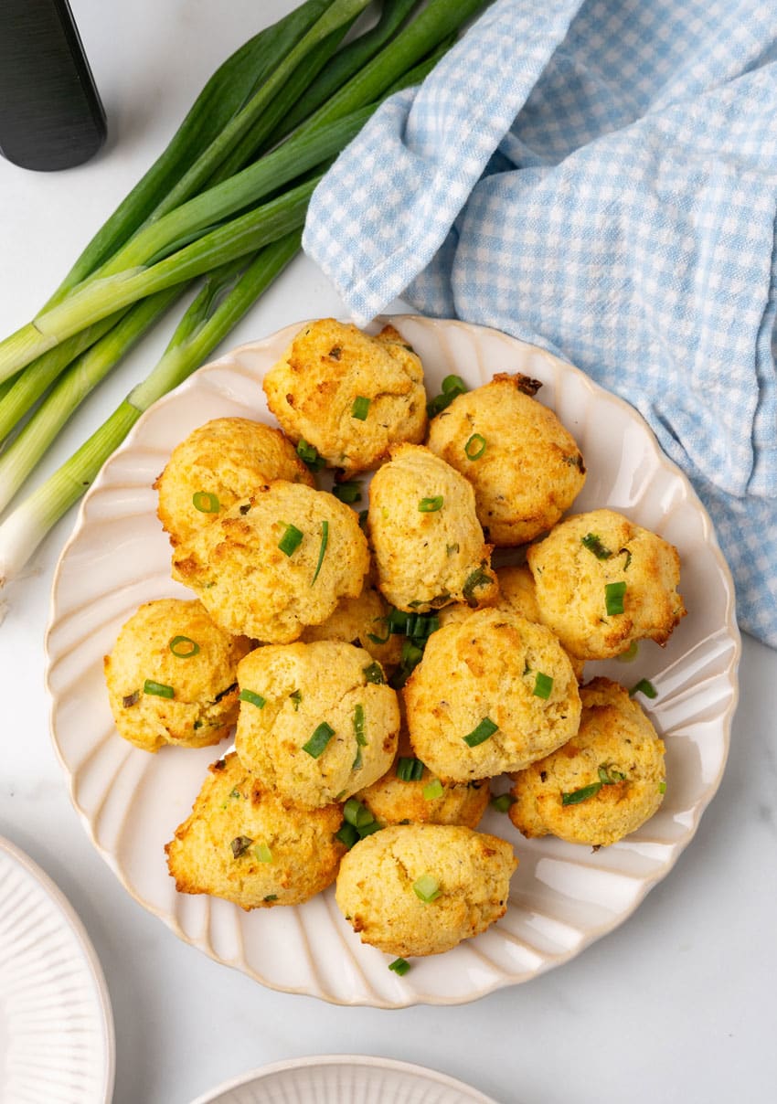 a pile of air fryer hushpuppies on a white plate