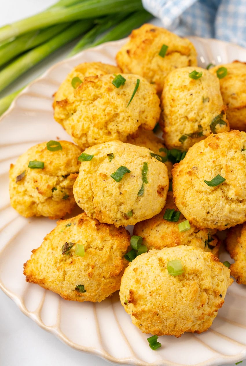 a pile of air fryer hushpuppies on a white plate