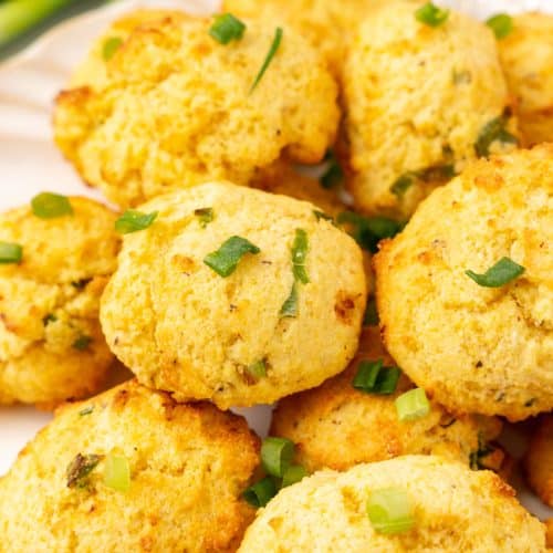 a pile of air fryer hushpuppies on a white plate