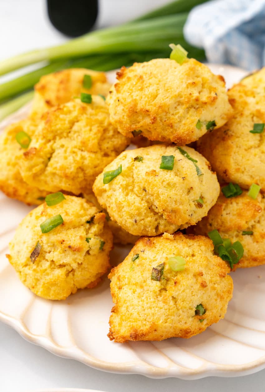 a pile of air fryer hushpuppies on a white plate