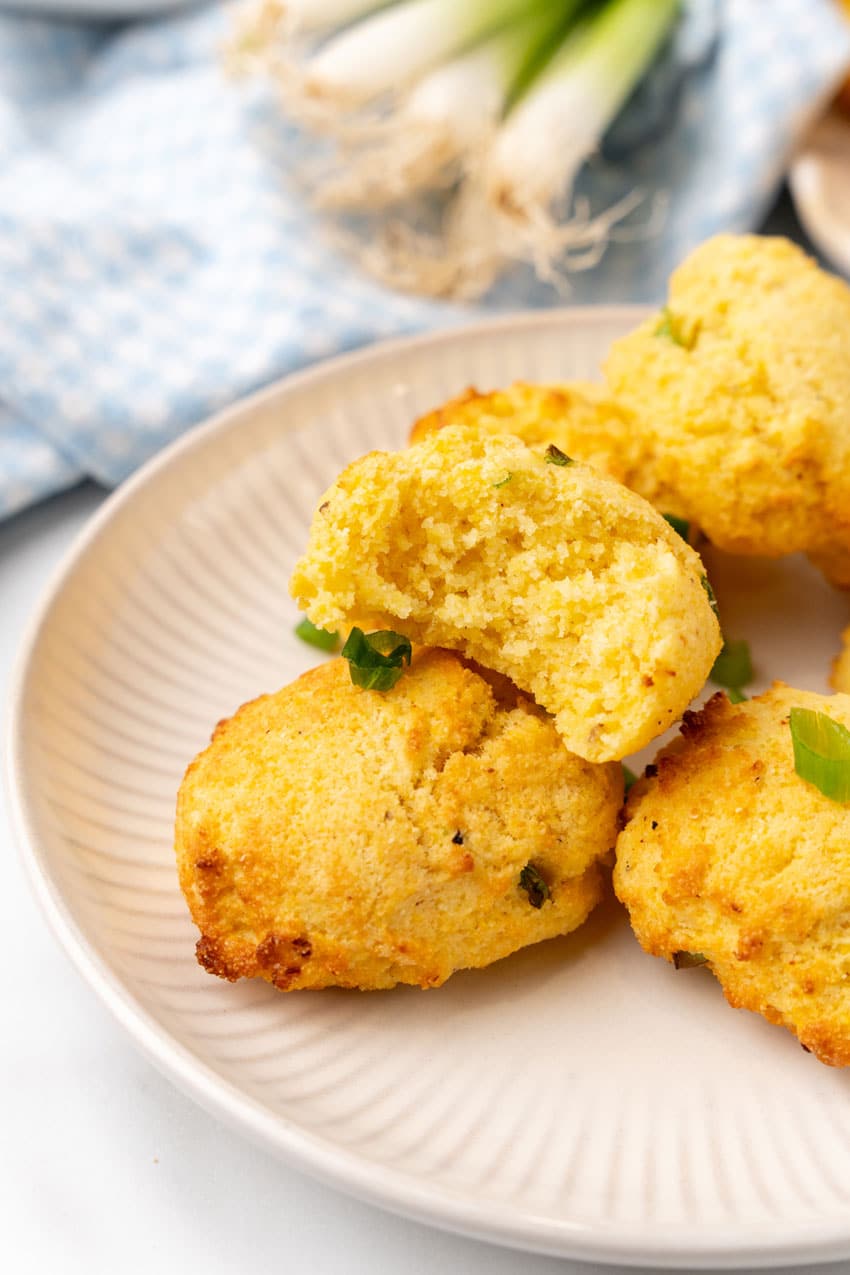 a pile of air fryer hushpuppies on a white plate