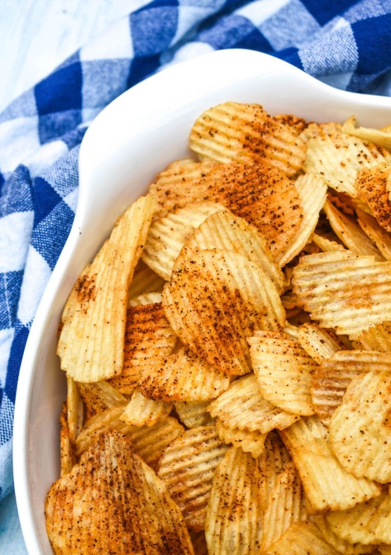 smoked potato chips in a white serving bowl