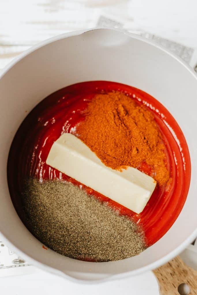homemade barbecue sauce ingredients in a white mixing bowl