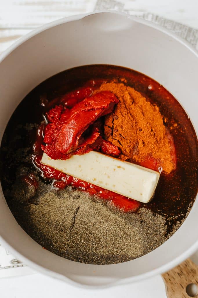 homemade barbecue sauce ingredients in a white mixing bowl