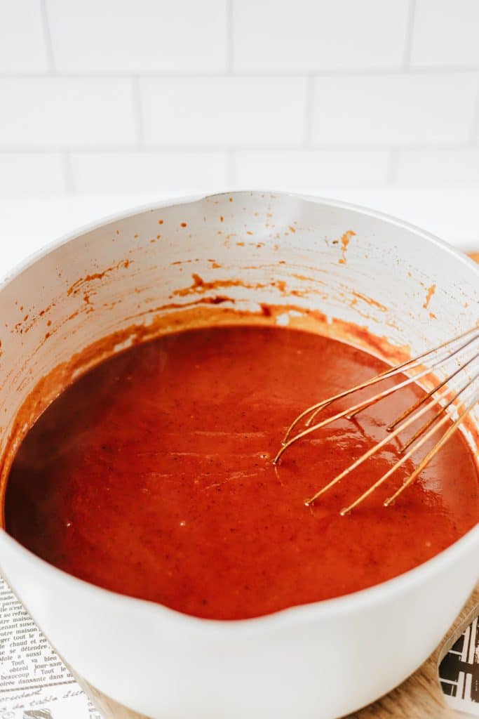 homemade barbecue sauce in a white mixing bowl