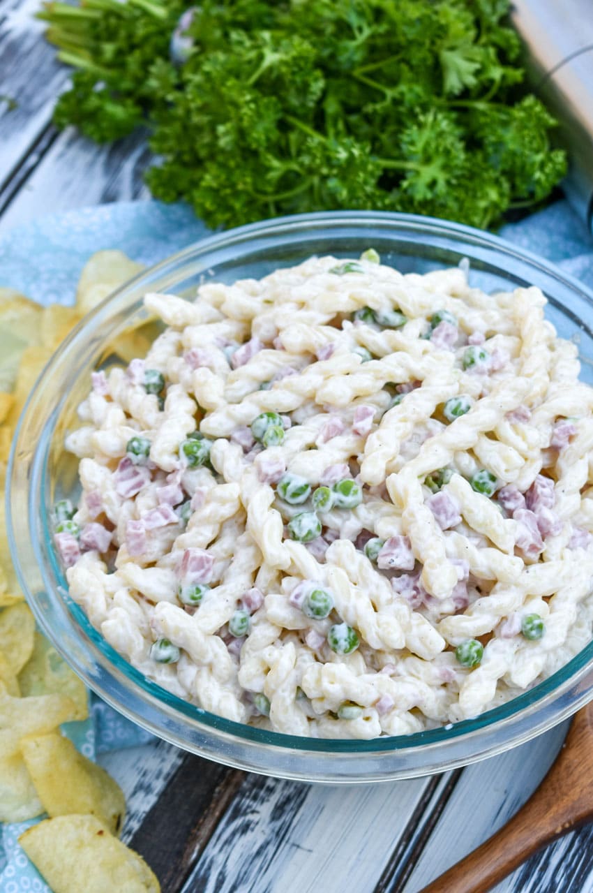 ruby tuesday's pasta salad copycat recipe in a glass mixing bowl