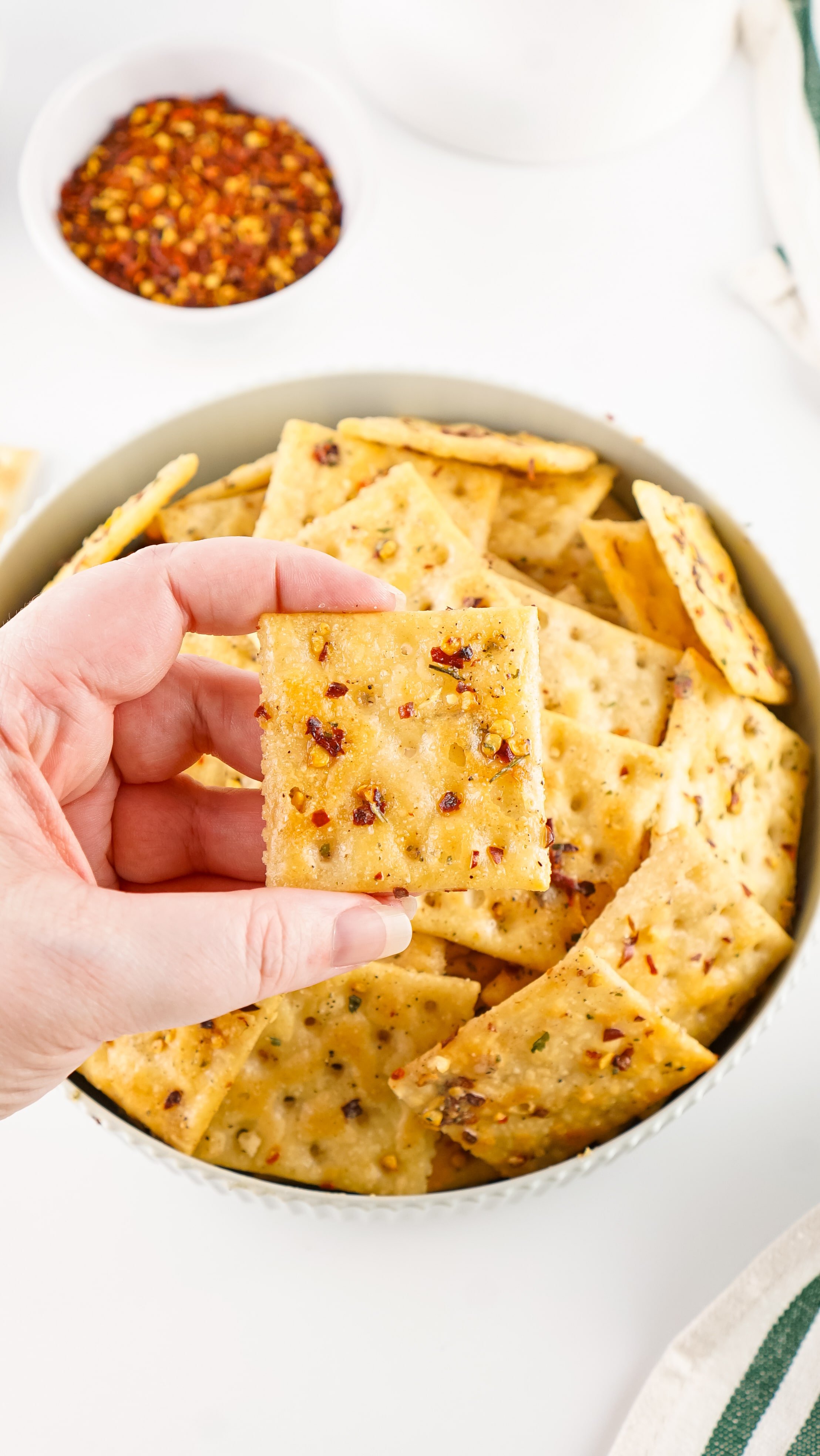 a hand holding up a alabama fire cracker