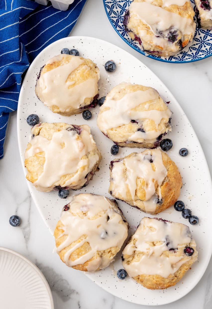 copycat glazed bo-berry biscuits on a white serving platter