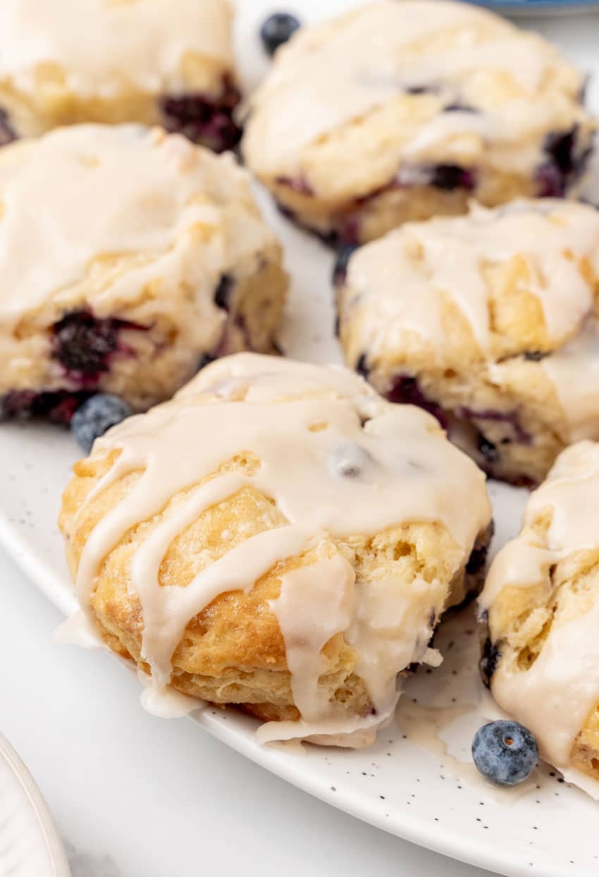 copycat glazed bo-berry biscuits on a white serving platter