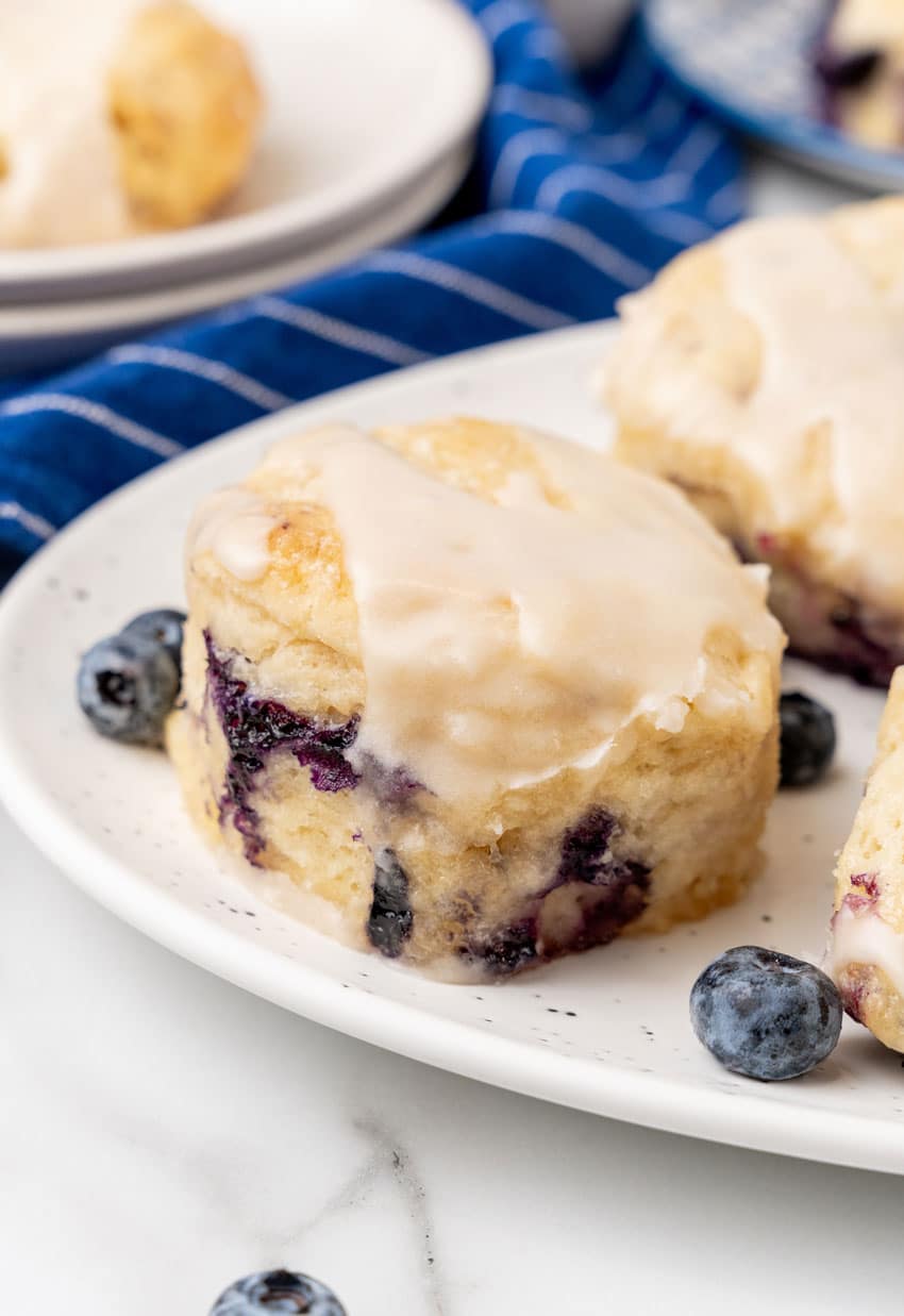 copycat glazed bo-berry biscuits on a white serving platter