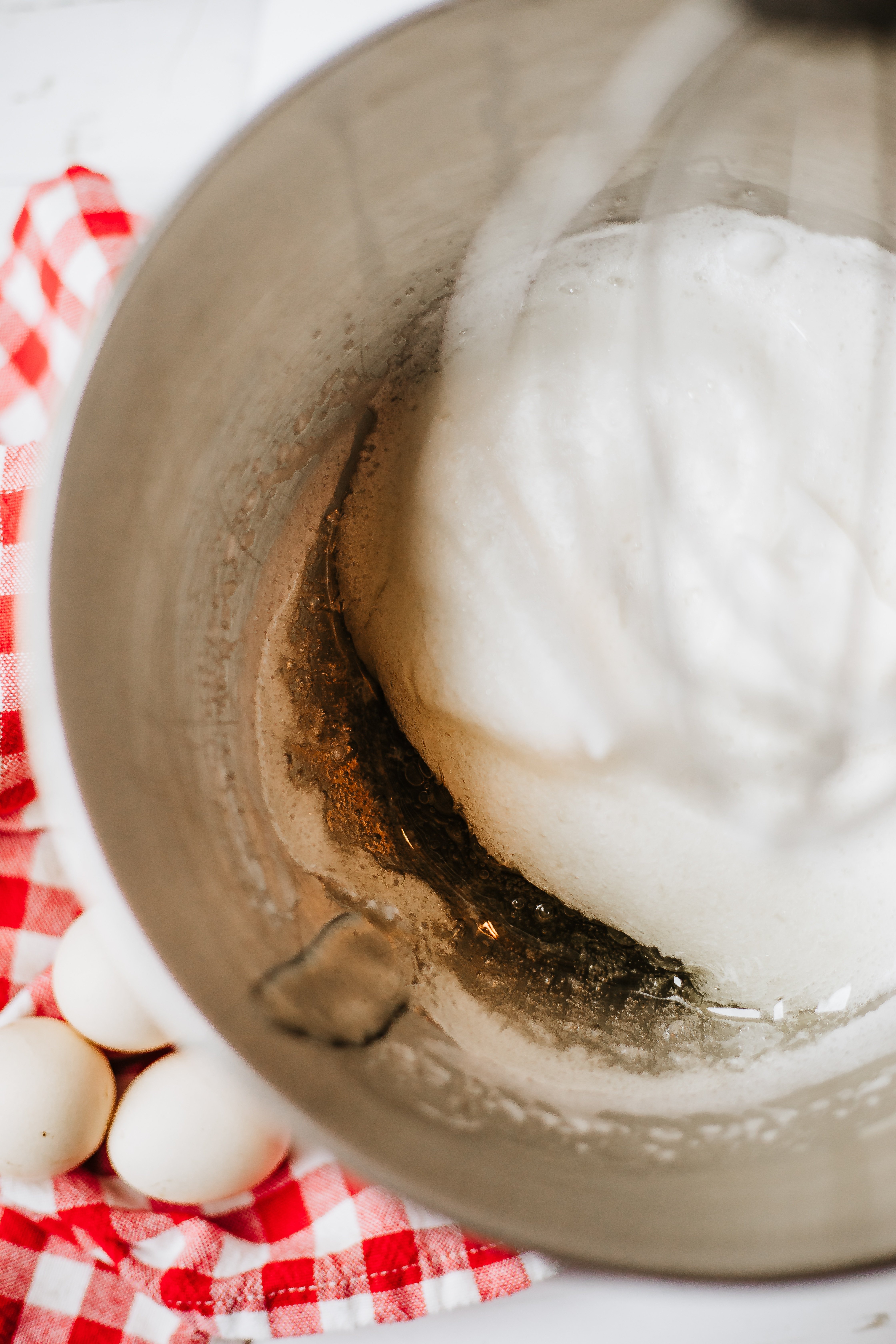 homemade marshmallow fluff batter in a metal mixing bowl