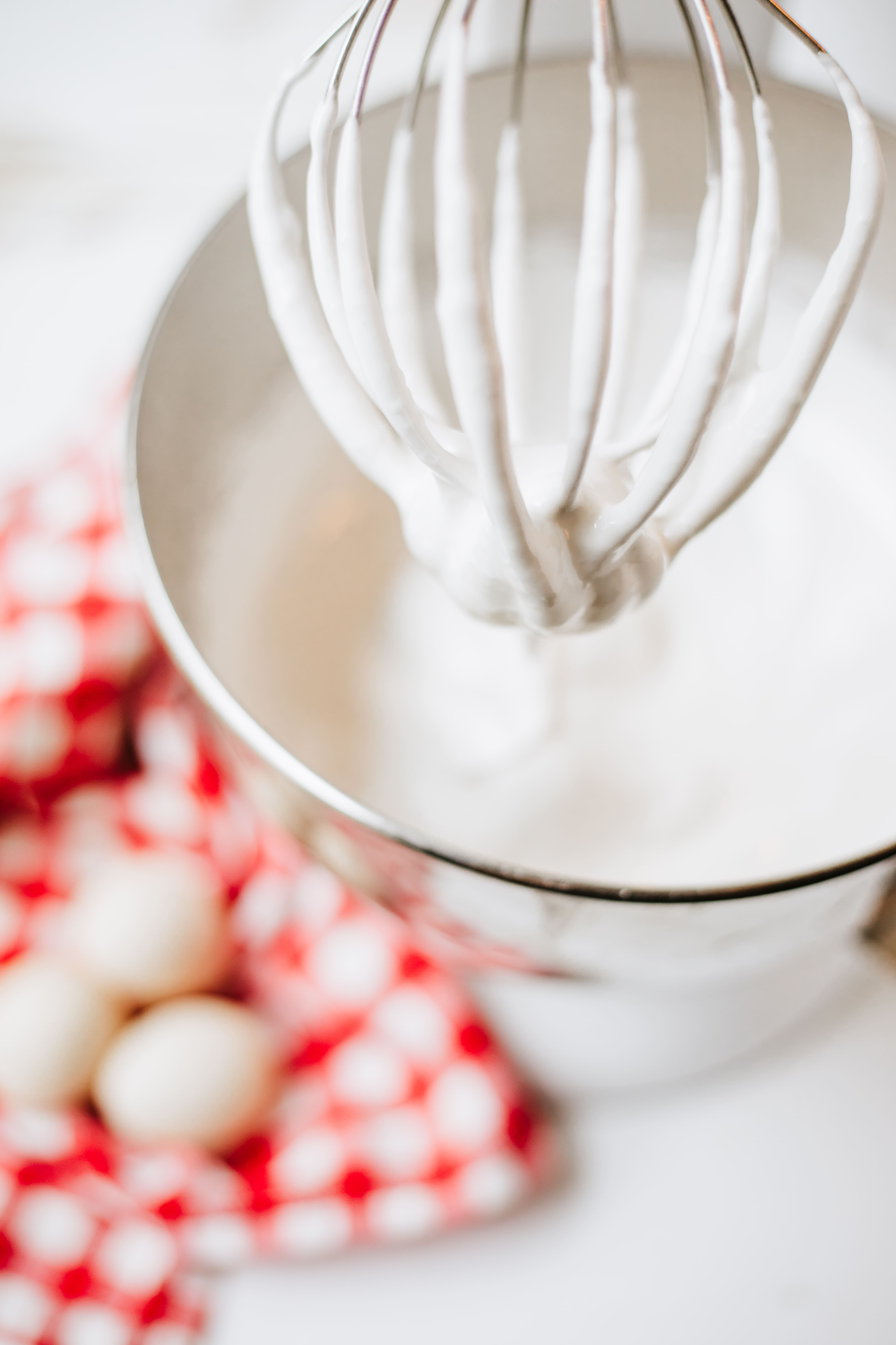 homemade marshmallow fluff batter in a metal mixing bowl