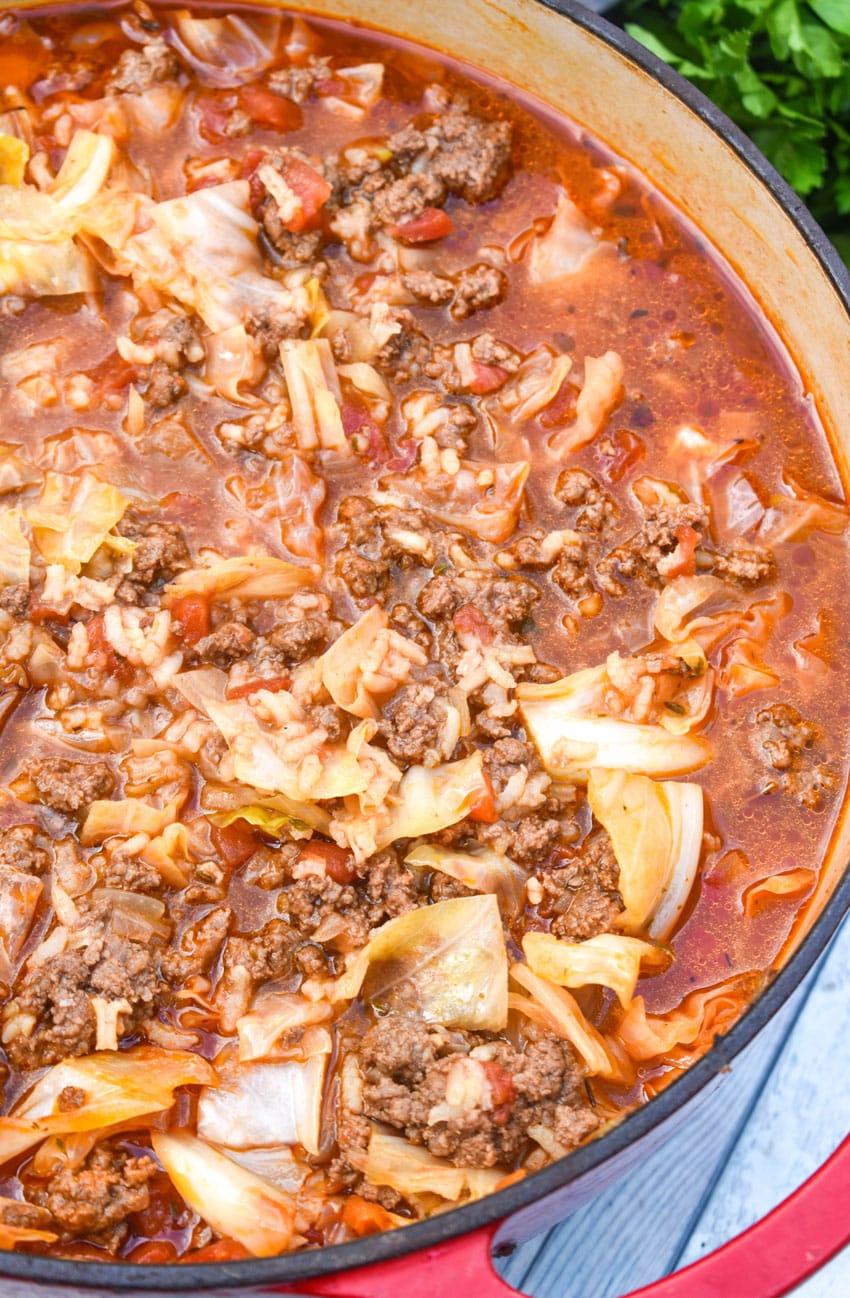 unstuffed cabbage soup in a large red dutch oven