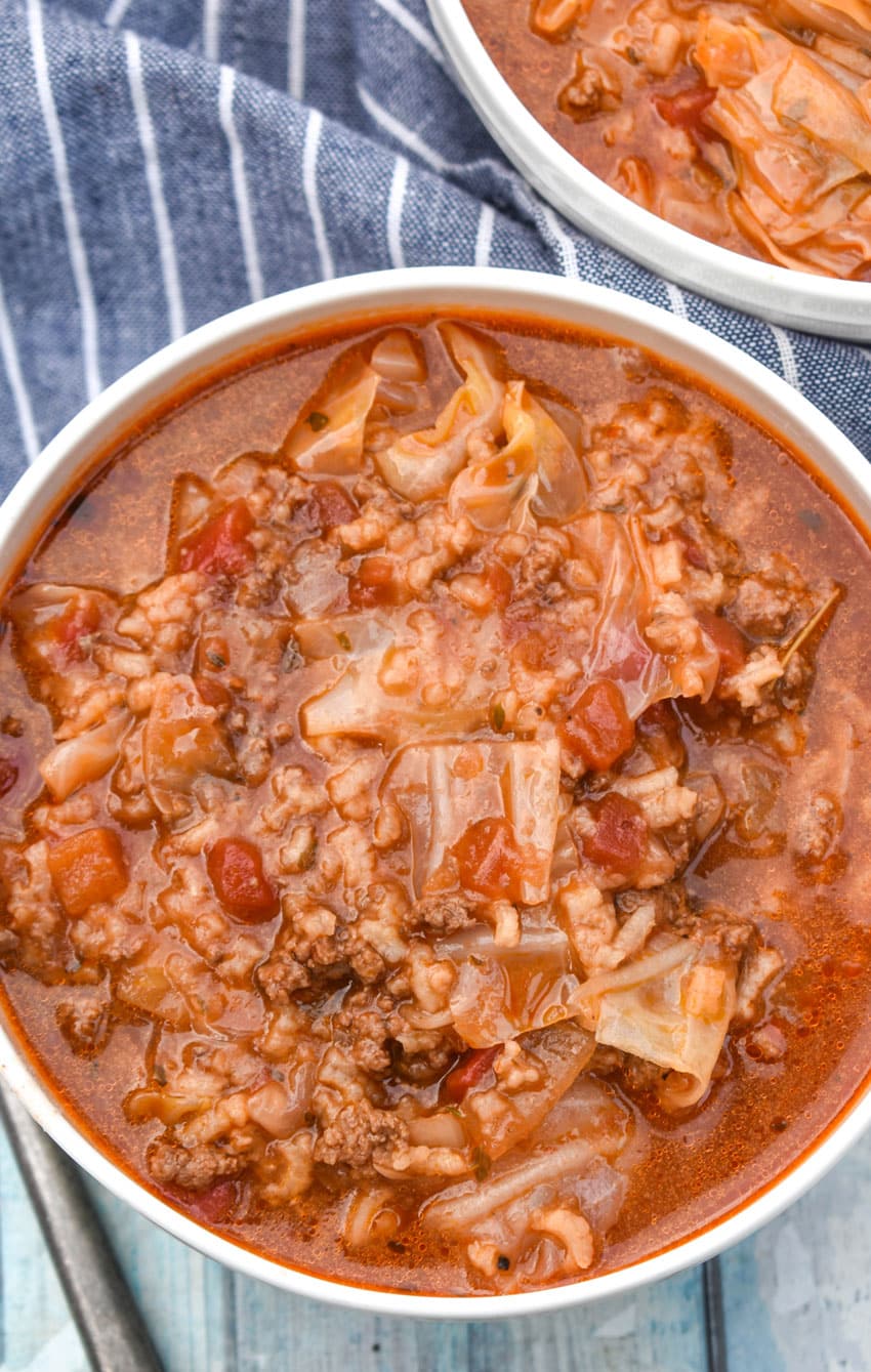 unstuffed cabbage soup in two white bowls