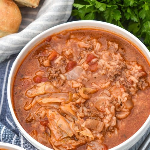 unstuffed cabbage soup in two white bowls