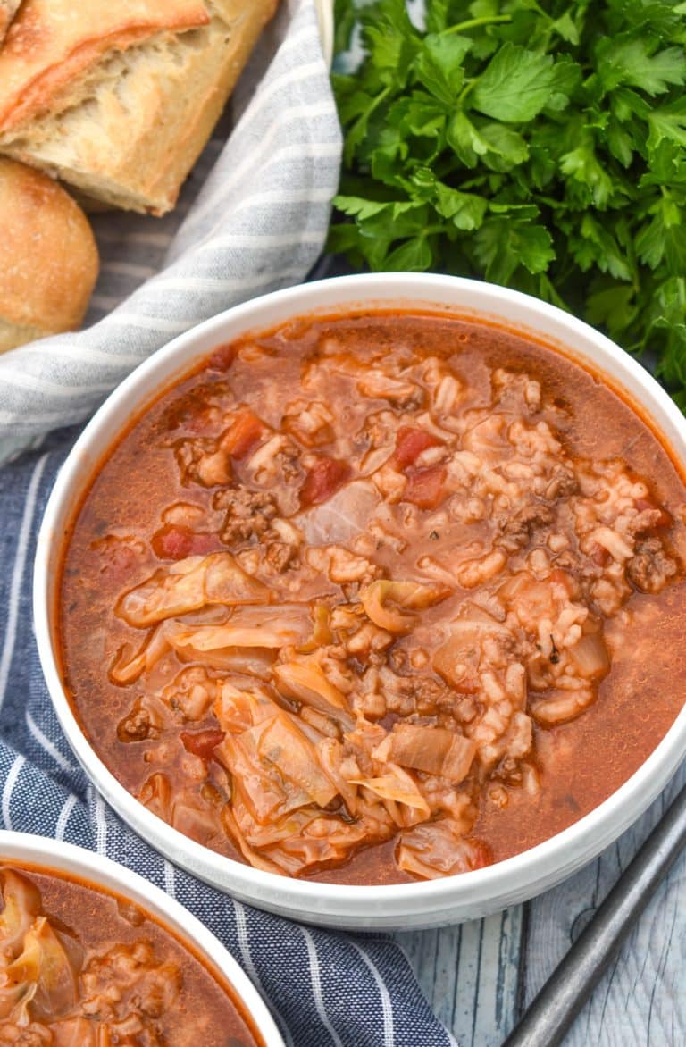 unstuffed cabbage soup in two white bowls