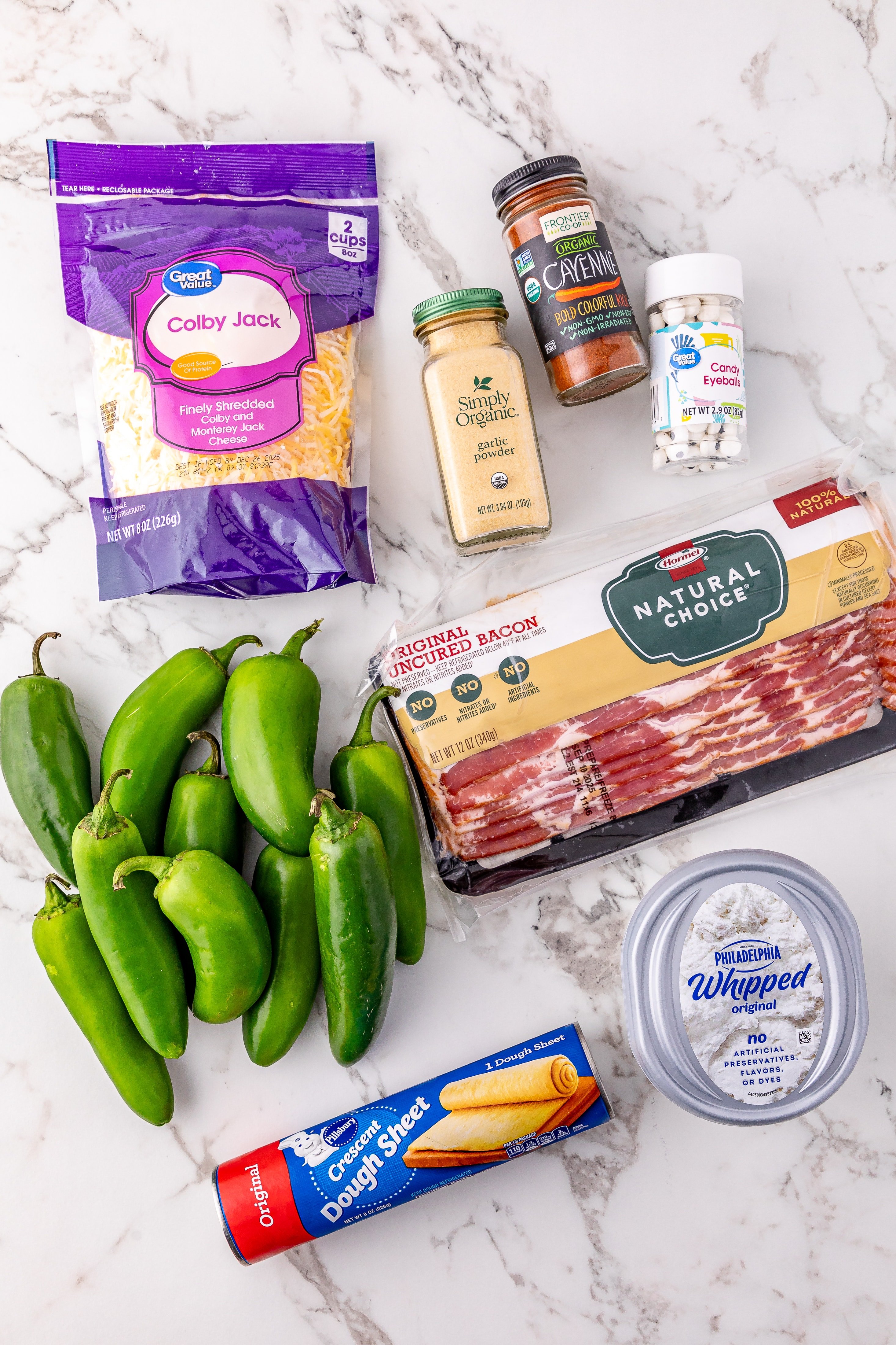 an overhead image showing the measured ingredients needed to make a batch of jalapeno popper mummies