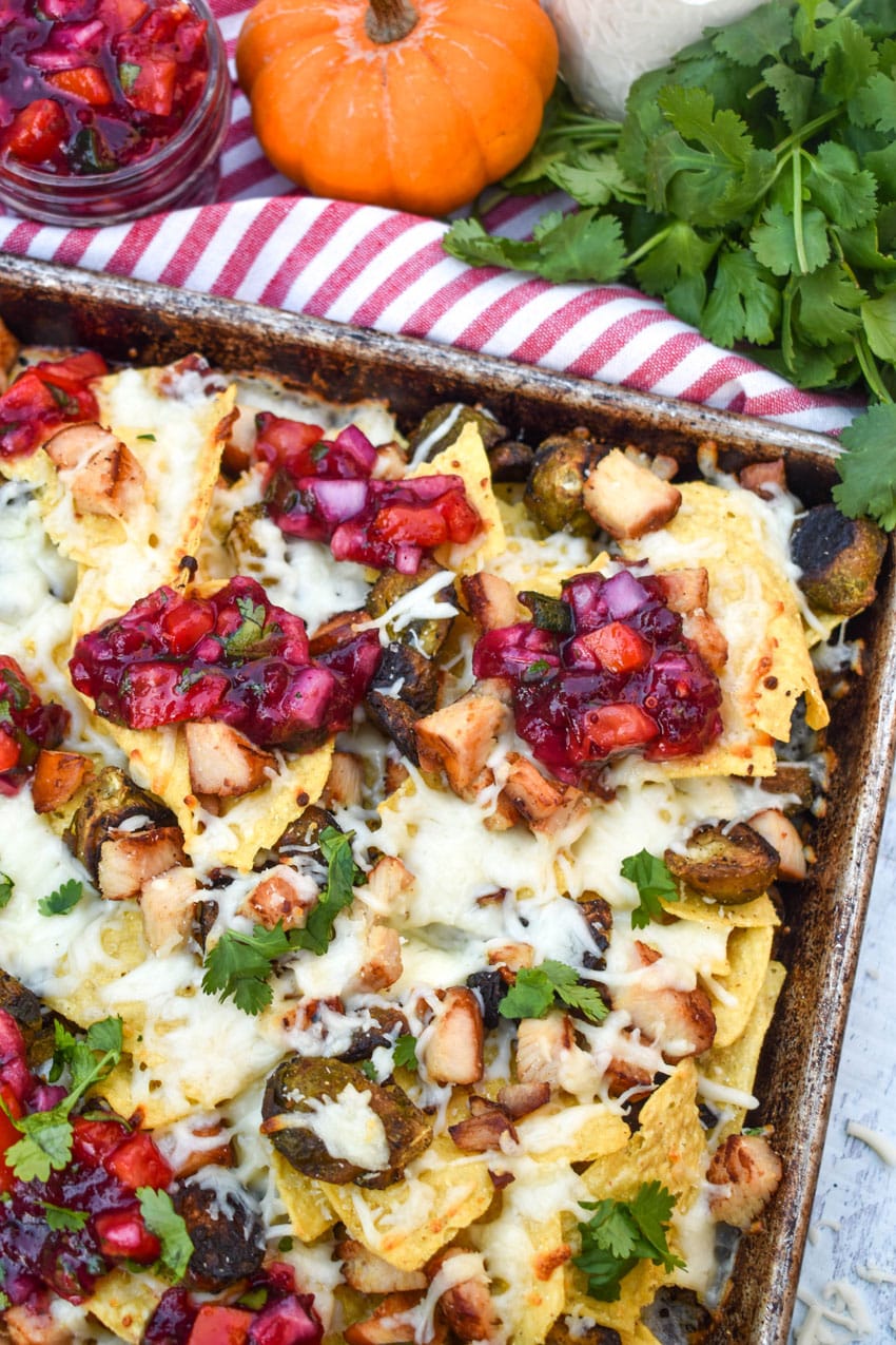 thanksgiving nachos on a rimmed baking sheet