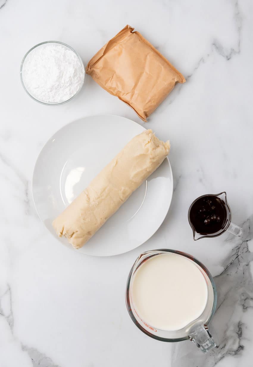 an overhead image showing the measured ingredients needed to make a batch of boston cream pie cookie cups