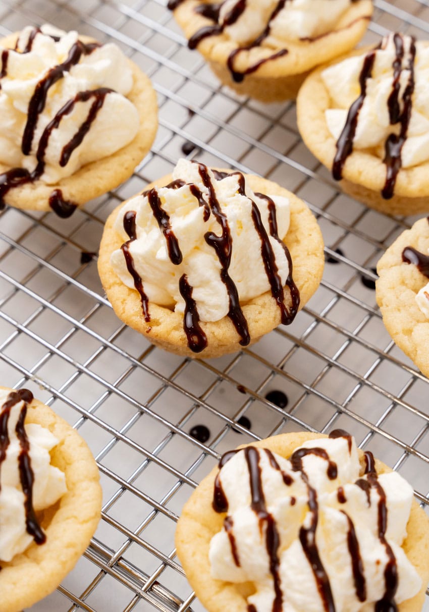 boston cream pie cookie cups on a wire baking rack