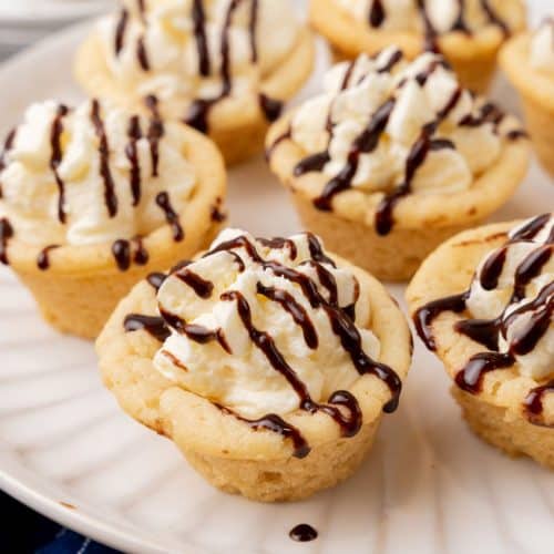 boston cream pie cookie cups on a white serving plate