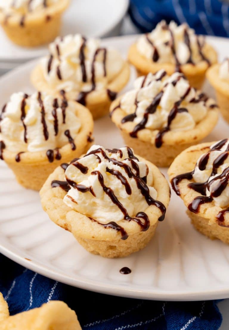 boston cream pie cookie cups on a white serving plate