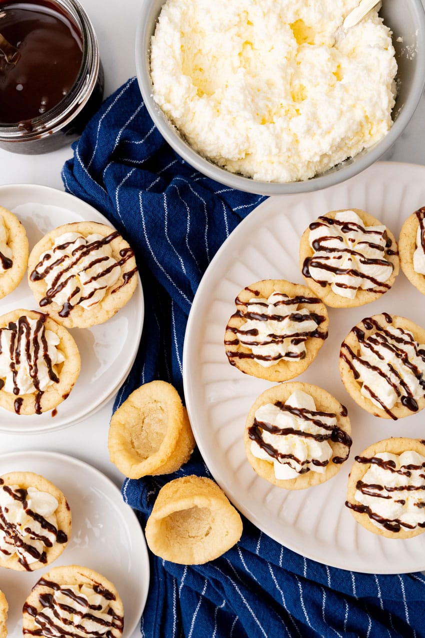 boston cream pie cookie cups on a white serving plate