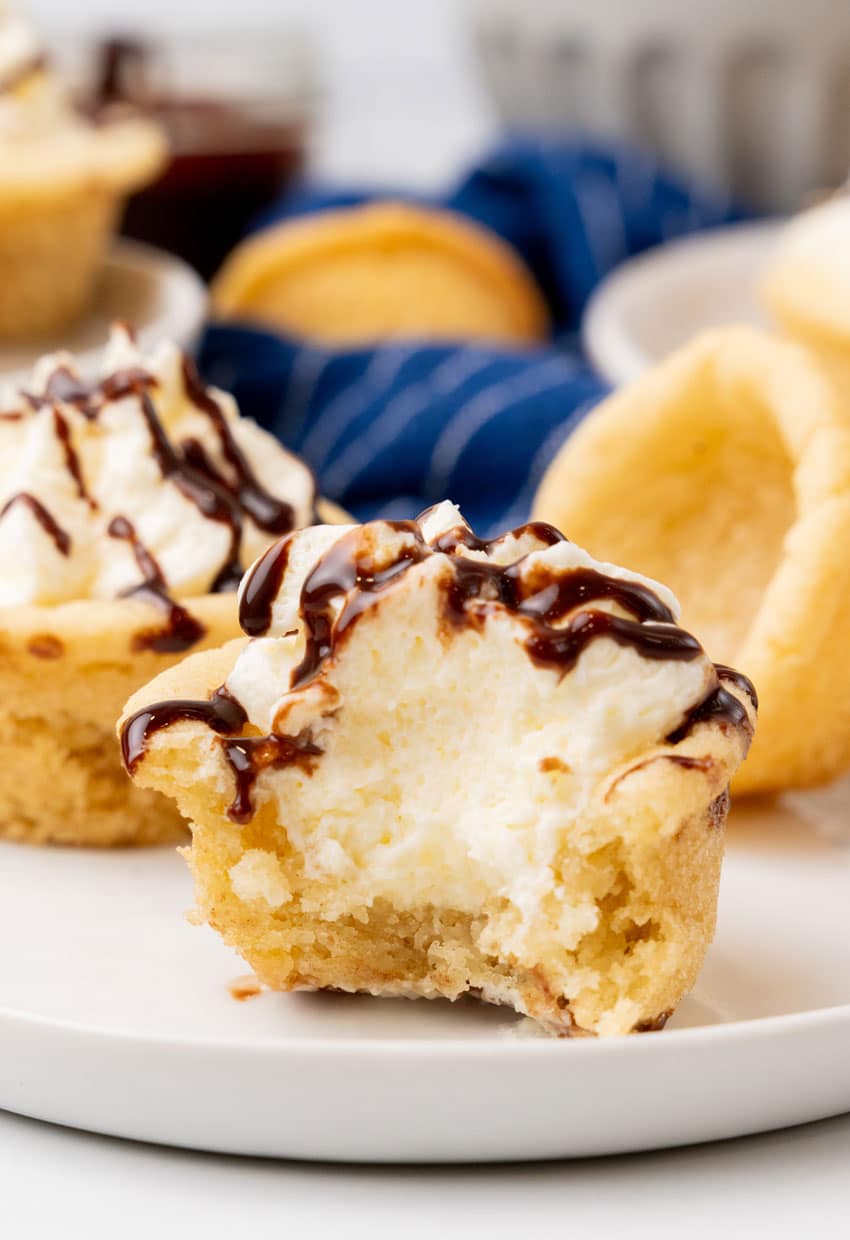 boston cream pie cookie cups on a white serving plate