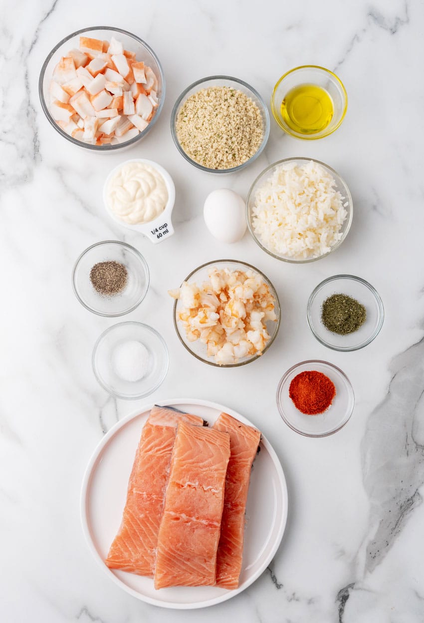 an overhead image showing the measured ingredients needed to make a batch of crab stuffed salmon