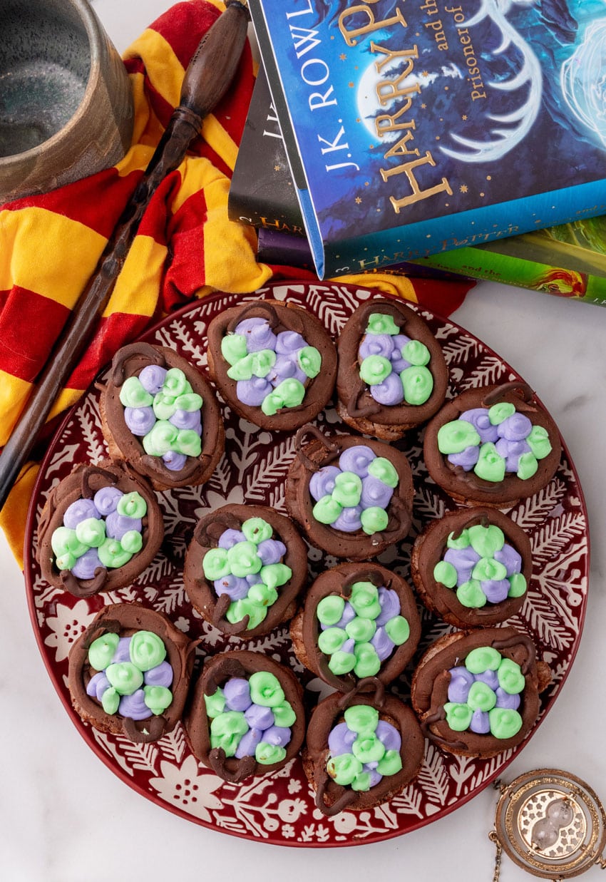 a close up of harry potter cauldron cupcakes