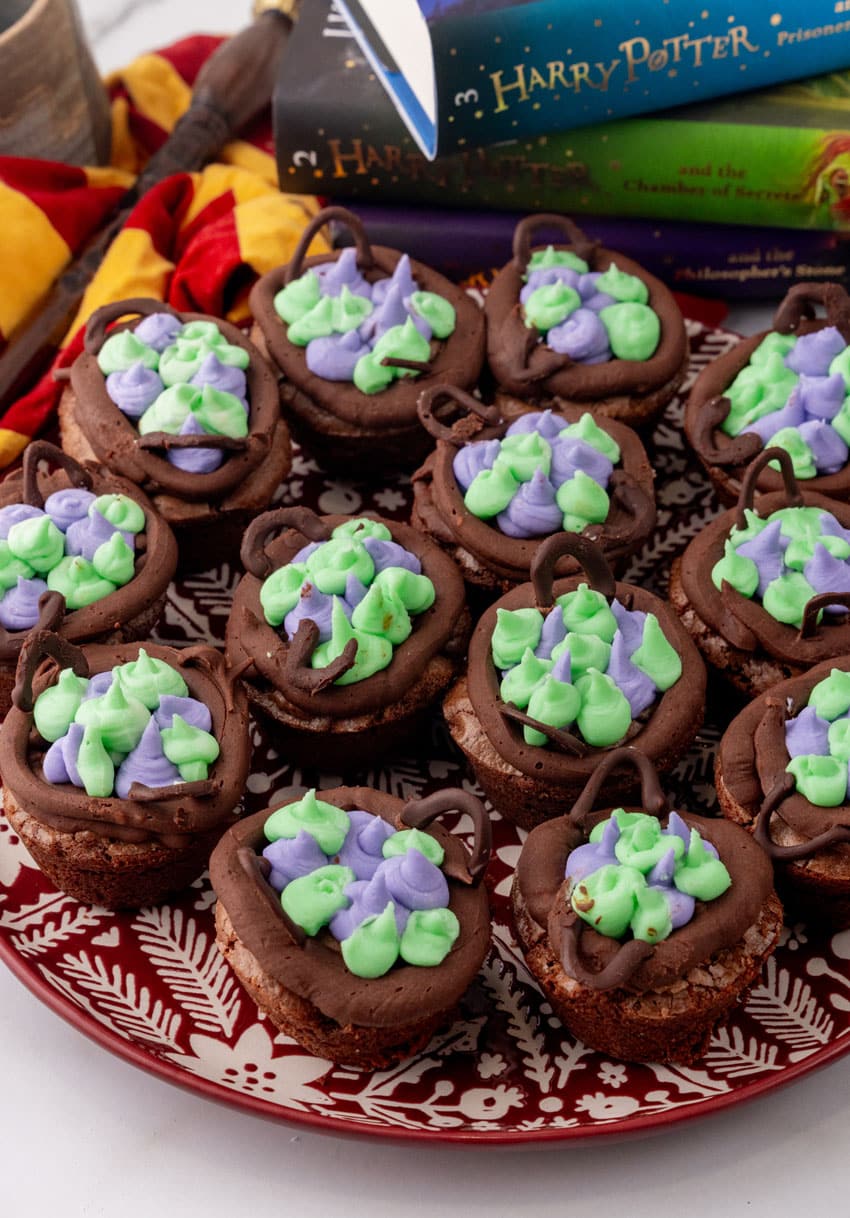 a close up of harry potter cauldron cupcakes