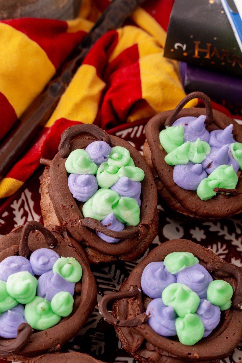 a close up of harry potter cauldron cupcakes