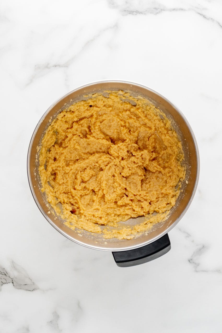 homemade sugar cookie dough in a metal mixing bowl