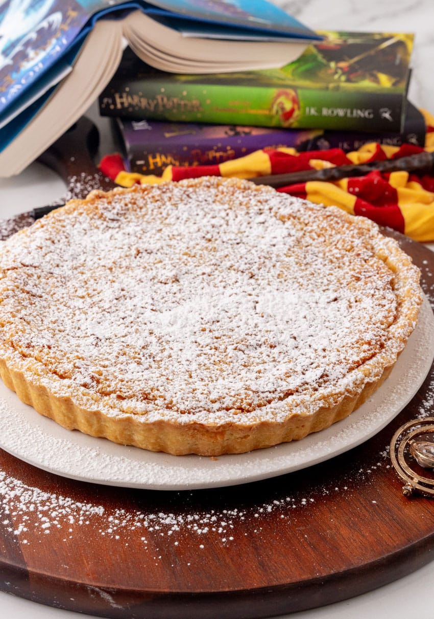 a harry potter treacle tart on a white serving platter