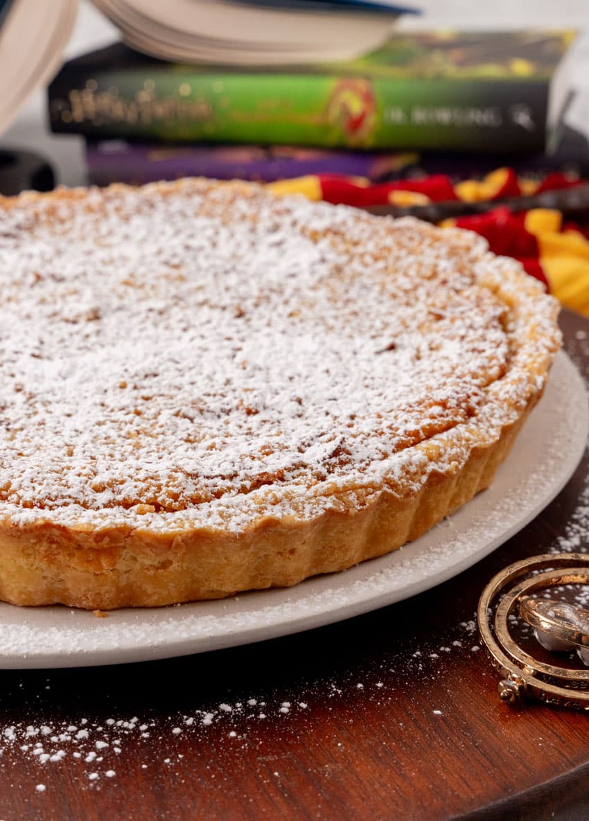 a harry potter treacle tart on a white serving platter