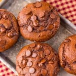 double chocolate chunk muffins on a metal tray