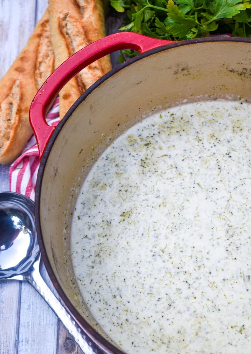 cream of broccoli soup in a large red dutch oven