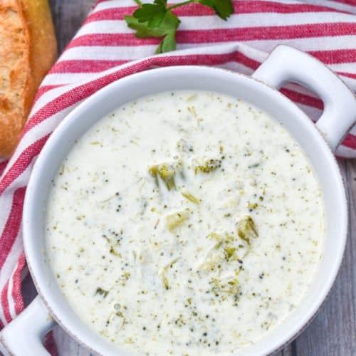 cream of broccoli soup in a small gray bowl