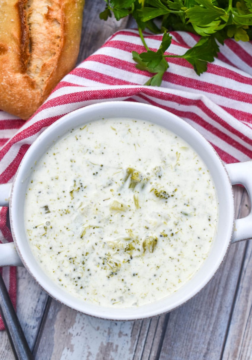 cream of broccoli soup in a small gray bowl