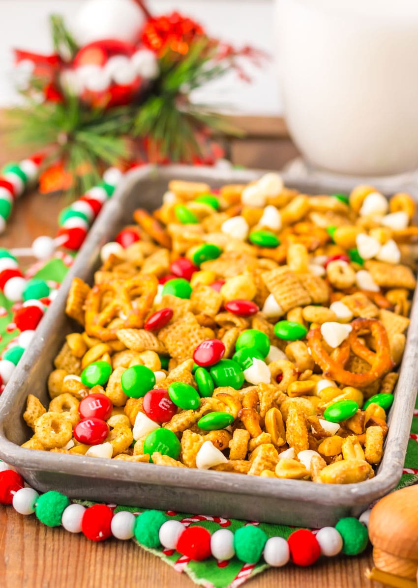 slow cooker christmas chex mix in a metal tray